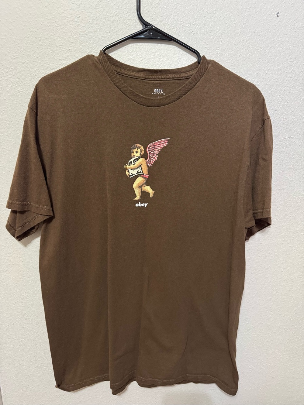 Obey Brown Graphic Tee with Pink Winged Cherub